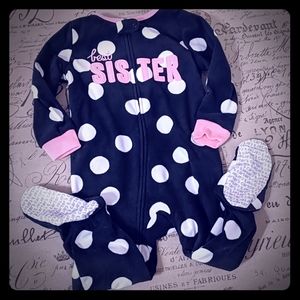 Black and white polka dot pajama onesie